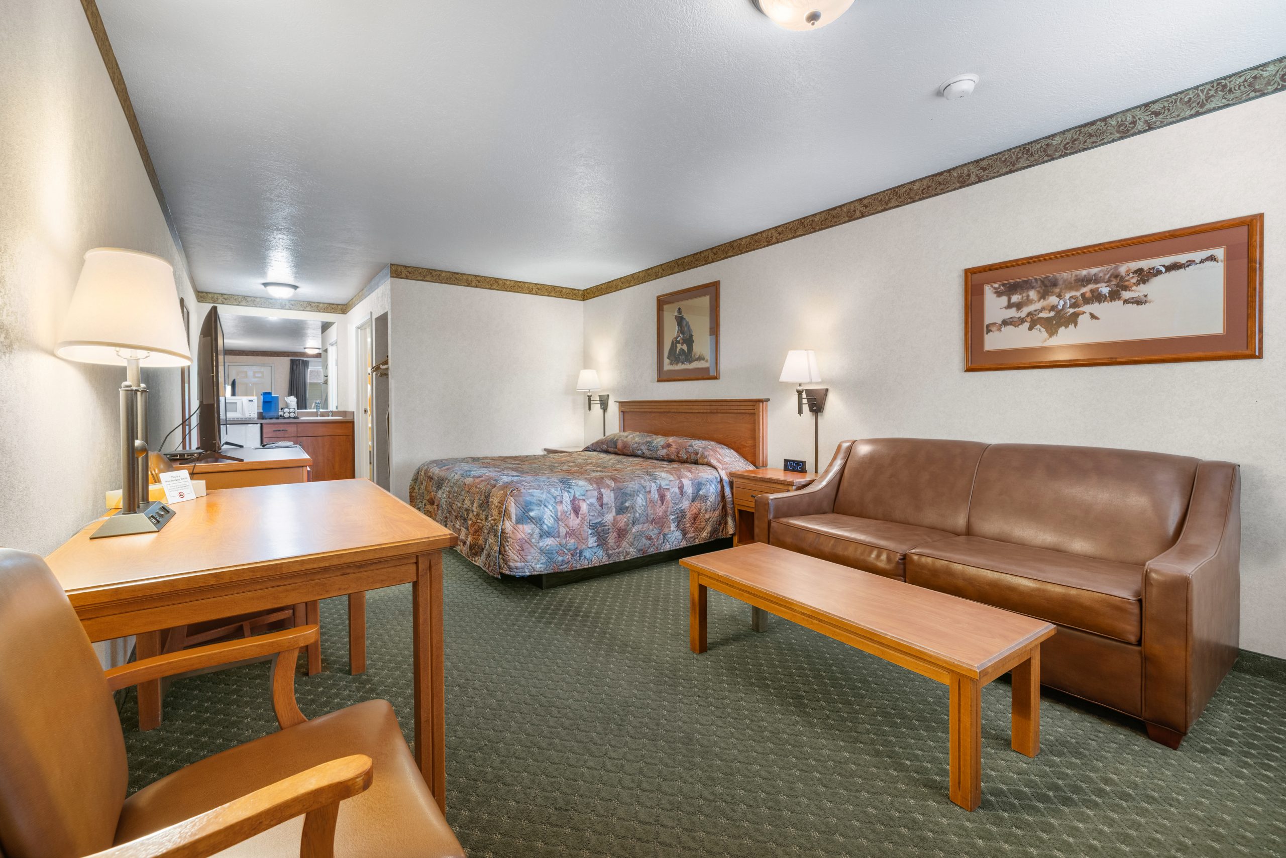 King suite with sofa and kitchenette at the White River Inn